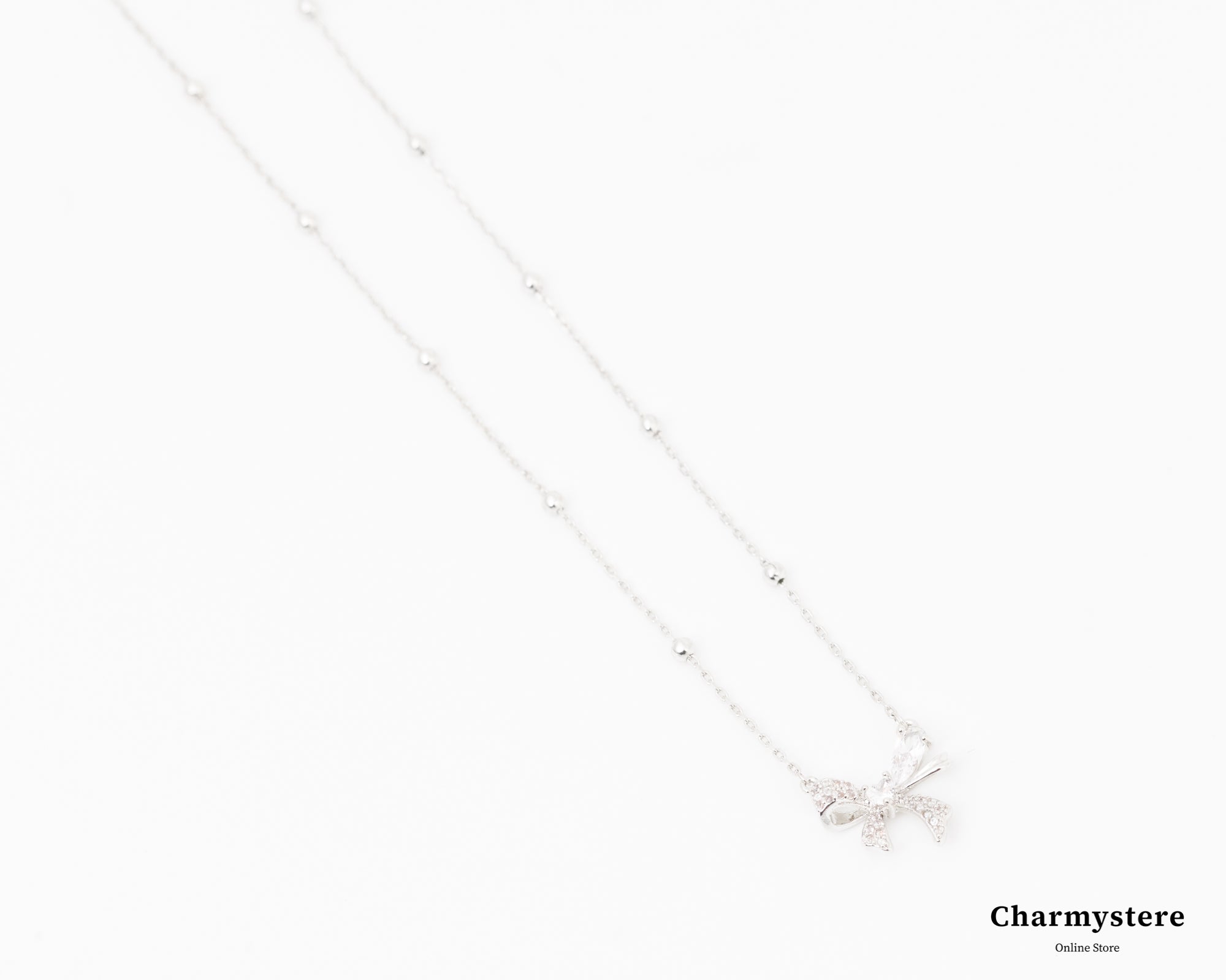 フェミニンリボンドットチェーンネックレス