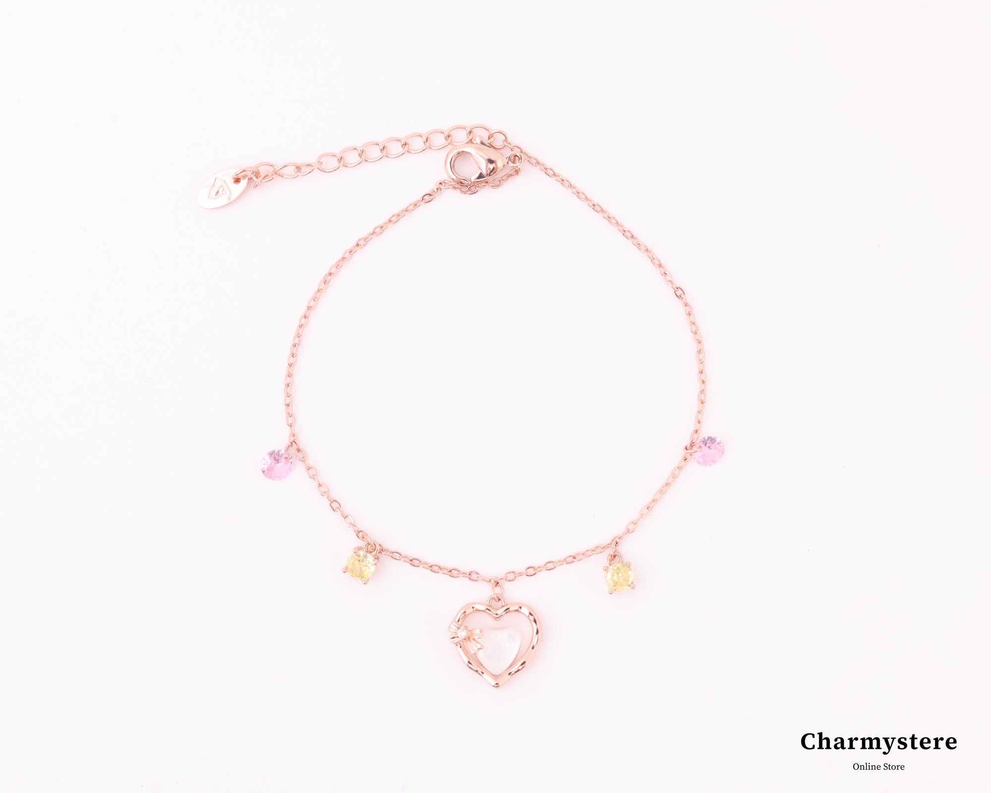 ハートチャームフェミニンカラーストーンブレスレット