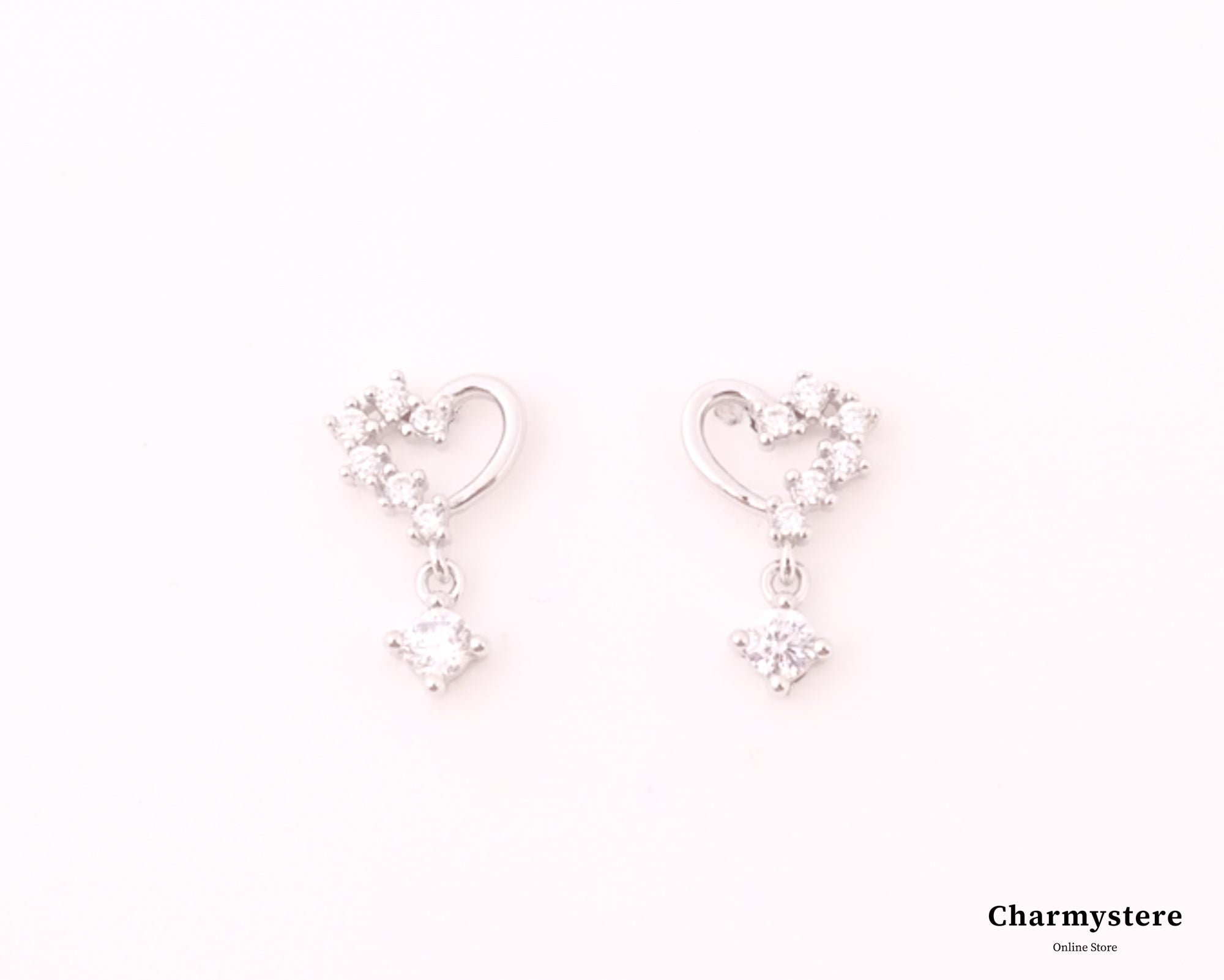 ミニマムハートハーフパヴェスイングストーンピアス｜Charmystere