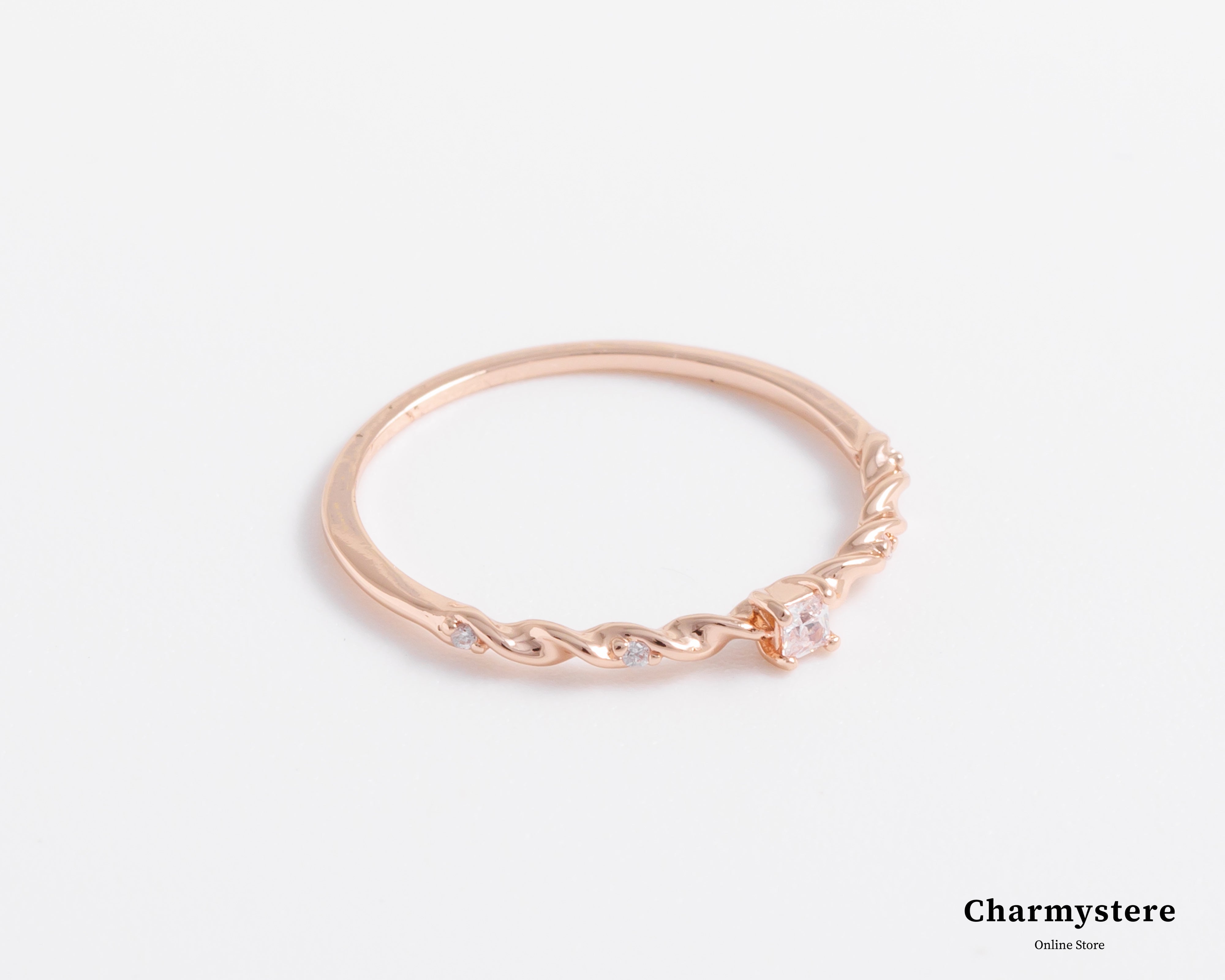 Twist one point pink gold ring