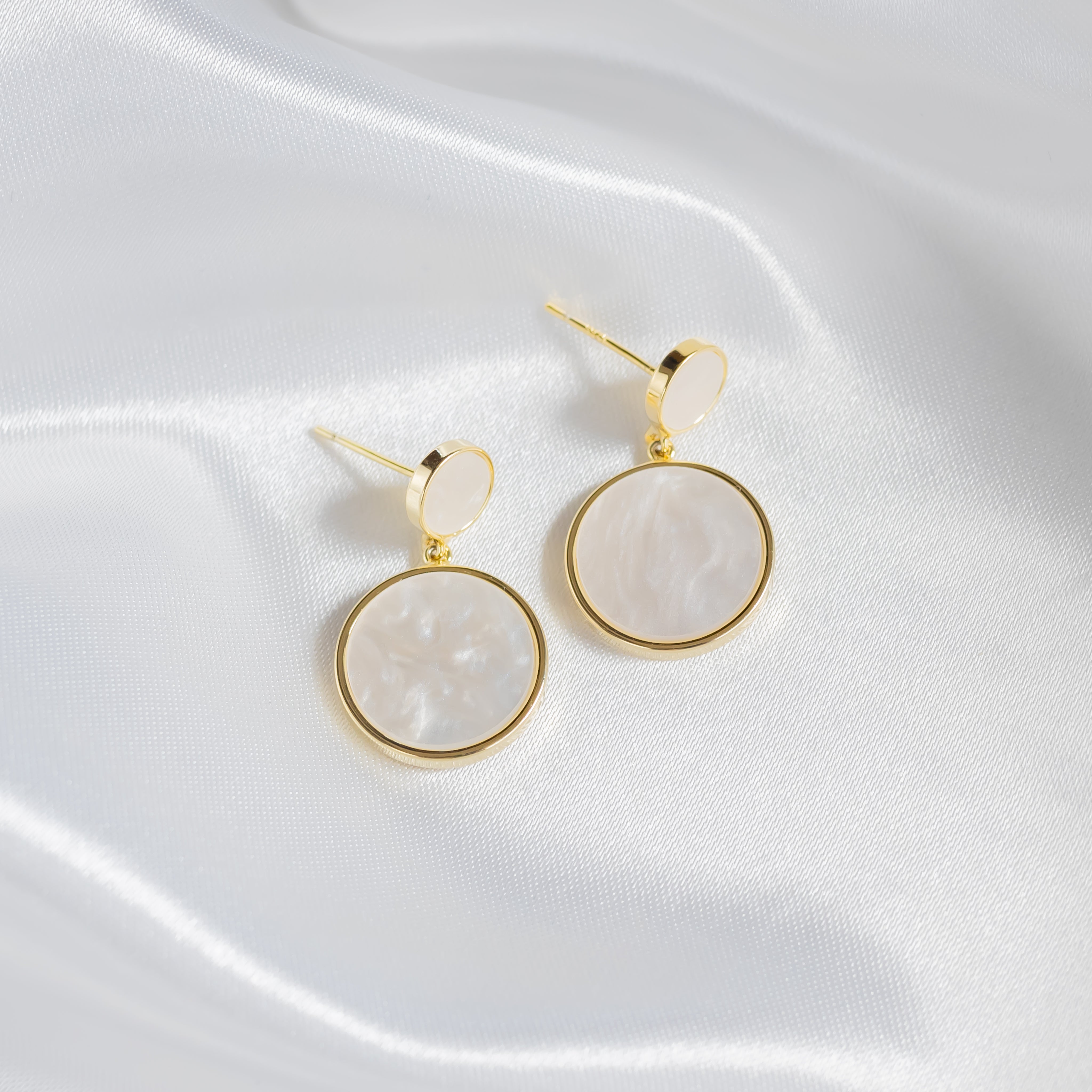 medallion earrings